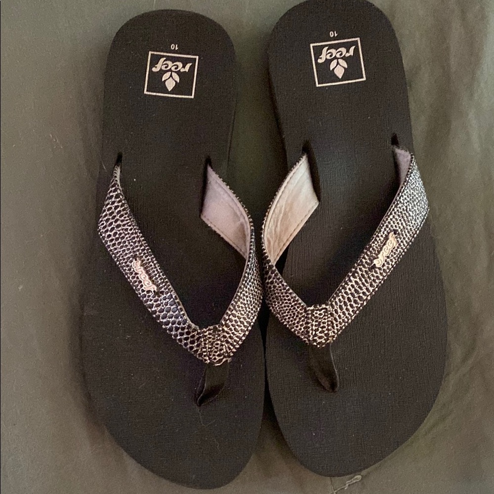Reef Black and Metallic Flip Flops